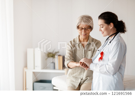 patient and a doctor in medical office 121691566