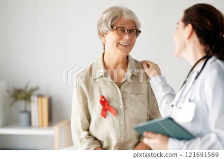 patient and a doctor in medical office patient and a doctor in medical office 121691569