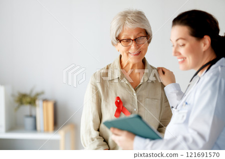 patient and a doctor in medical office patient and a doctor in medical office 121691570