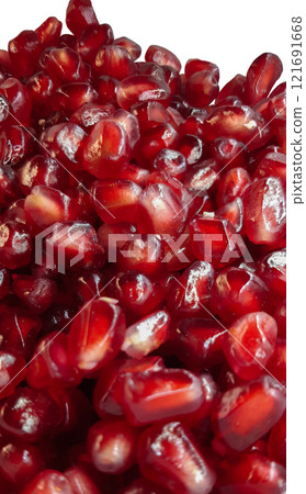 Bright red pomegranate seeds. A pile of ripe, peeled pomegranate seeds. 121691668