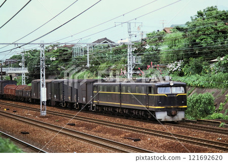1977: A freight train pulled by EH10 running near Ashiya Station 121692620