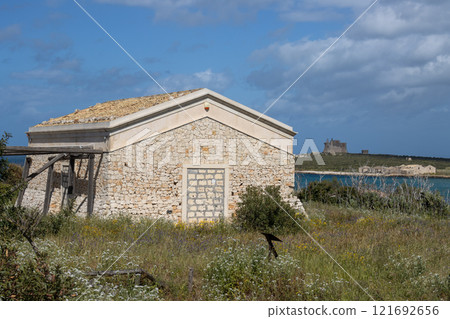 Stone house on a coast, Portopalo, Sicily, Italy 121692656