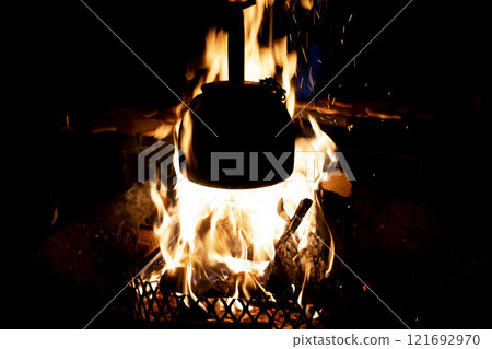 Soup Cooking on fire inside a Kota Cabin in Lapland Finland 121692970