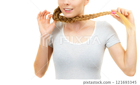 Blonde young woman with braid hair 121693345