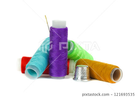 Sewing thimbles, bobbin and needle 121693535