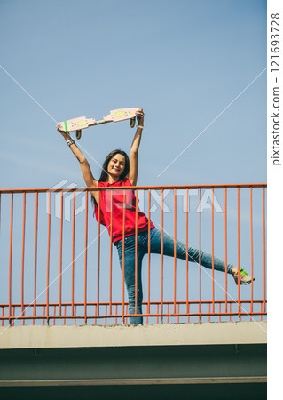 Urban skate girl with skateboard. Urban skate girl with skateboard. 121693728