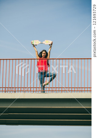 Urban skate girl with skateboard. 121693729