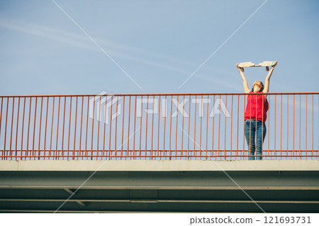 Urban skate girl with skateboard. Urban skate girl with skateboard. 121693731