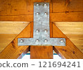 iron sheet connects wooden beams 121694241