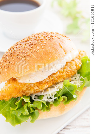 Delicious fish burger and hot coffee 121695912