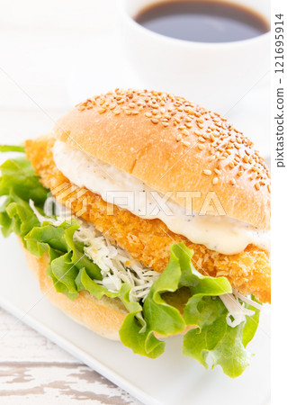Delicious fish burger and hot coffee 121695914