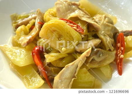 stir fried pickled cabbage with slice pork stomach and chili on plate stir fried pickled cabbage with slice pork stomach and chili on plate 121696696