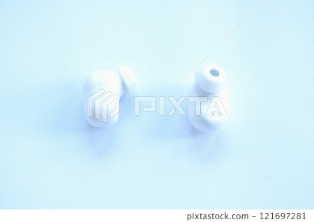 wireless earphone for conecting with mobile phone arranging on white background wireless earphone for conecting with mobile phone arranging on white background 121697281