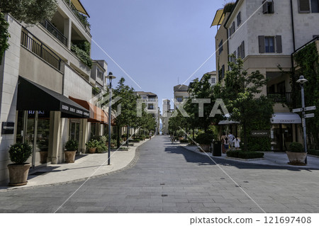 Montenegro, Porto Montenegro, Tivat, Shopping street with luxury shops. Montenegro, Porto Montenegro, Tivat, Shopping street with luxury shops. 121697408