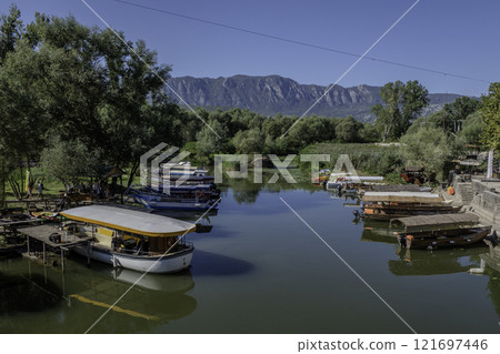 Montenegro, Skadar Lake National Park and its nature reserve. Boat for tourists Montenegro, Skadar Lake National Park and its nature reserve. Boat for tourists 121697446