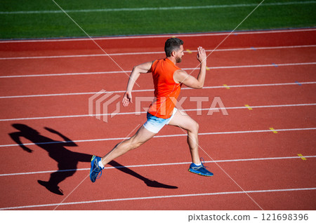 guy sprinter running from start to finish with success and speed, anaerobic load guy sprinter running from start to finish with success and speed, anaerobic load 121698396