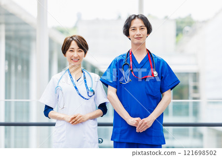Young medical workers working in hospital 121698502