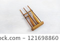 Miniature Angklung, the traditional sundanese musical instrument made from bamboo. Isolated on white background 121698860
