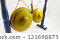 Miniature Gong, a traditional Javanese musical instrument. Miniature Indonesian Javanese Traditional Gamelan Music Instruments in White Isolated Background 121698873