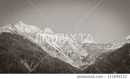 Wonderful wooded mountain and alpine panorama in Carinthia Austria. Wonderful wooded mountain and alpine panorama in Carinthia Austria. 121699132