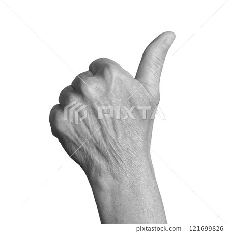 Thumbs up gesture. Senior woman s wrinkled hand with thumb raised, symbolizing approval, success, or 121699826