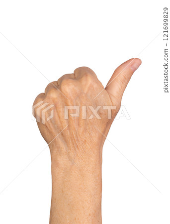 Thumbs up gesture. Senior woman s wrinkled hand with thumb raised in a dorsal view, symbolizing Thumbs up gesture. Senior woman s wrinkled hand with thumb raised in a dorsal view, symbolizing 121699829