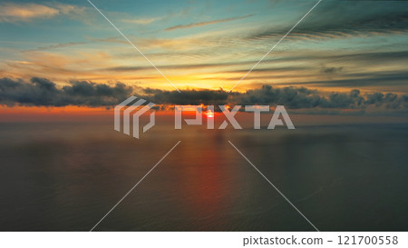 Sea surface and beautiful sunset 121700558