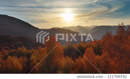 Aerial view of colorful foliage at sunset in mountains Aerial view of colorful foliage at sunset in mountains 121700592