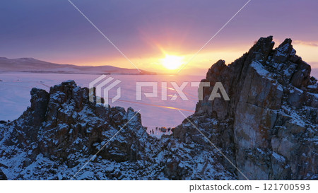 Shaman rock in frozen lake Baikal 121700593