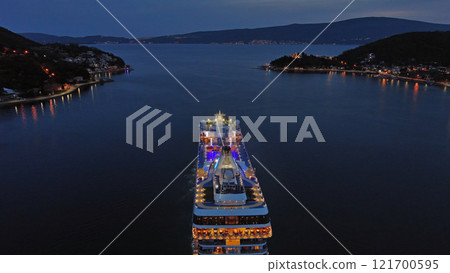 Illuminated cruise ship in sea at night Illuminated cruise ship in sea at night 121700595