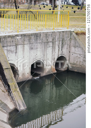 drain pipe or effluent or sewer release wastewater into river. Sewage or domestic wastewater or municipal wastewater that is product by community of people. waste water is any water that has been use drain pipe or effluent or sewer release wastewater into river. Sewage or domestic wastewater or municipal wastewater that is product by community of people. waste water is any water that has been use 121700756