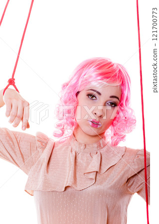 woman girl stylized like marionette puppet on string 121700773