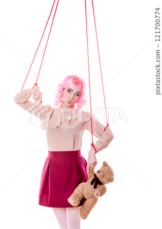 woman girl stylized like marionette puppet on string 121700774