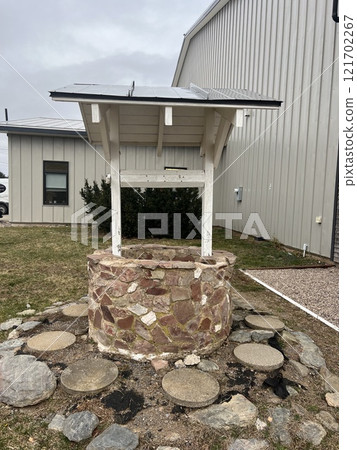 A photo of a well that has been well-maintained 121702267