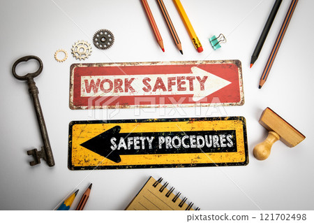 Work Safety and Safety Procedures. Red and yellow directional arrow with text Work Safety and Safety Procedures. Red and yellow directional arrow with text 121702498