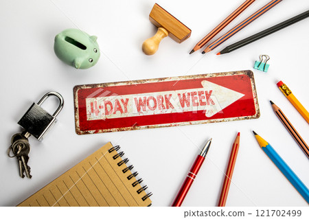 4-day work week. Red direction arrow with text on white office desk 4-day work week. Red direction arrow with text on white office desk 121702499