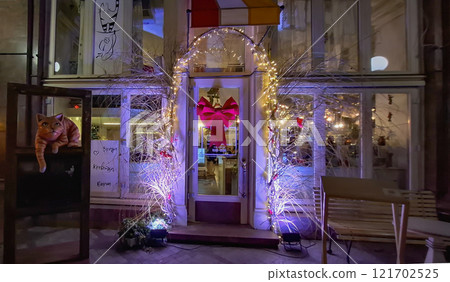 Cafe bar on Deribasovskaya 12 in Odessa. Original design of the entrance to a cafe bar on the central street in Odessa. Cafe bar on Deribasovskaya 12 in Odessa. Original design of the entrance to a cafe bar on the central street in Odessa. 121702525
