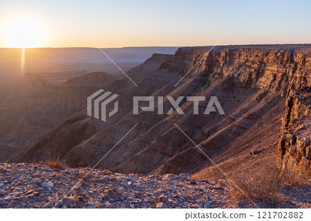 Sunset over fish river canyon 121702882