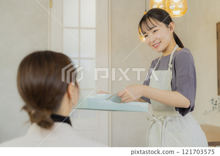 Cafe clerk woman Cafe clerk woman 121703575