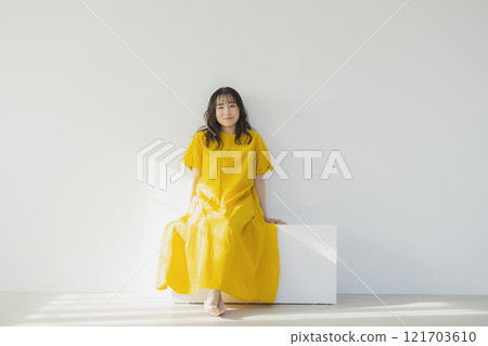 Yellow one piece woman Yellow one piece woman 121703610