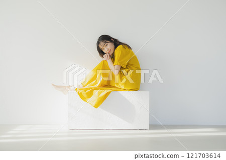 Yellow one piece woman Yellow one piece woman 121703614