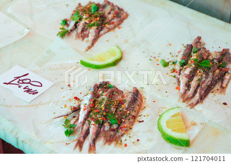 Marinated small fish sold at the market Marinated small fish sold at the market 121704011