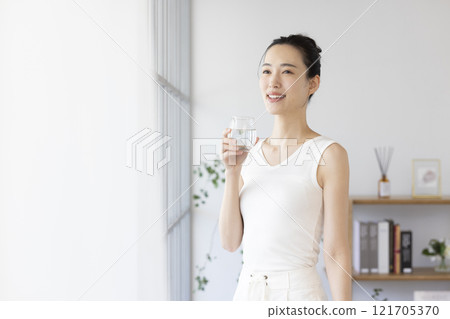 Diet woman drinking water Diet woman drinking water 121705370