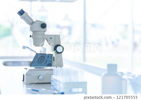 Microscope and experimental equipment in the laboratory 121705555