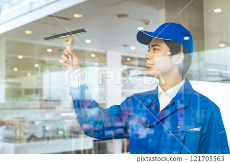 Workers cleaning window glass Cleaning staff Workers cleaning window glass Cleaning staff 121705563