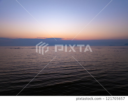 Aerial view sunset sky,Nature beautiful light sunset or sunrise over sea,Colorful scenery sunset sky,Amazing clouds and waves texture, sunrise sky background Aerial view sunset sky,Nature beautiful light sunset or sunrise over sea,Colorful scenery sunset sky,Amazing clouds and waves texture, sunrise sky background 121705657