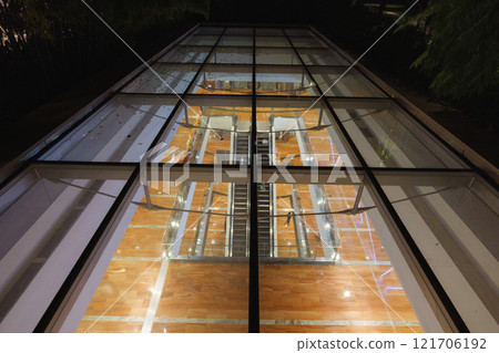 Chongqing, China - 03 Jan 2024: illuminated Raffles City Mall in the night. Chongqing, China - 03 Jan 2024: illuminated Raffles City Mall in the night. 121706192