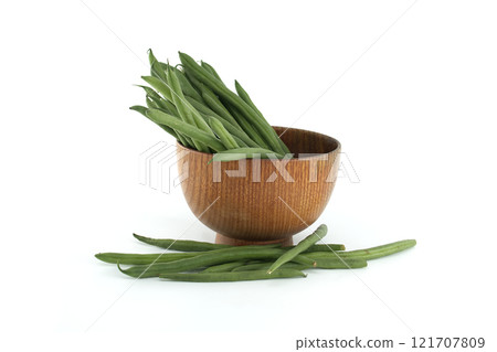 Fresh Green Beans in a Wooden Bowl on a White Background 121707809
