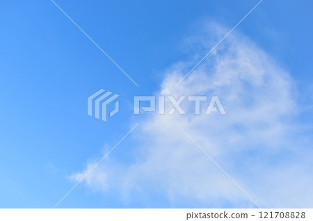 beautiful blue sky and white fluffy group of clouds with sunrise in the morning, natural background 121708828
