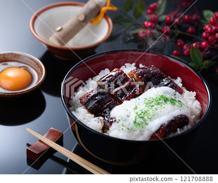 Eel and grated yam rice bowl is packed with nutritional value with fluffy grated yam and eel! Eel and grated yam rice bowl is packed with nutritional value with fluffy grated yam and eel! 121708888